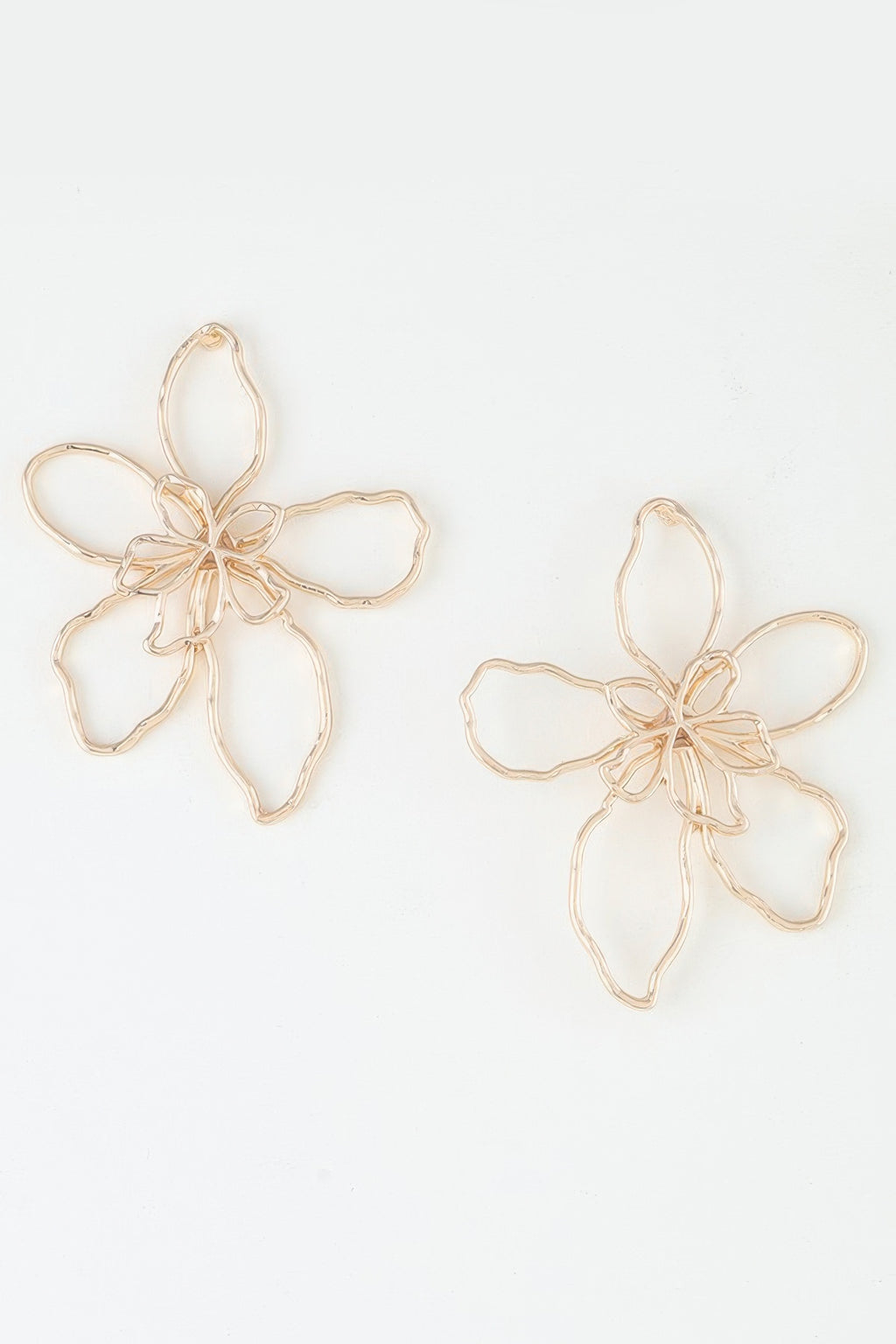 Delicate abstract flower earrings, gold-tone drop with thin five-petal design