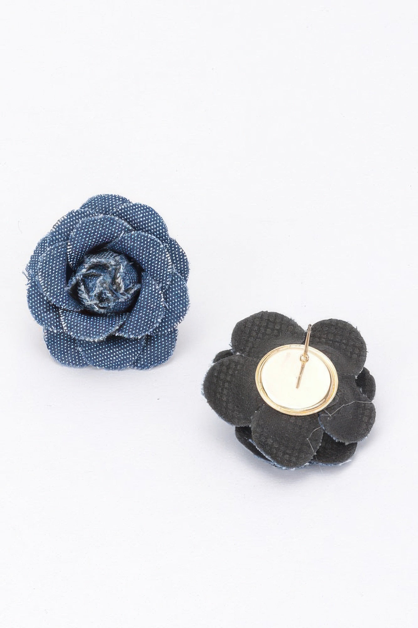 Denim flower earrings with black backing, blue rosette