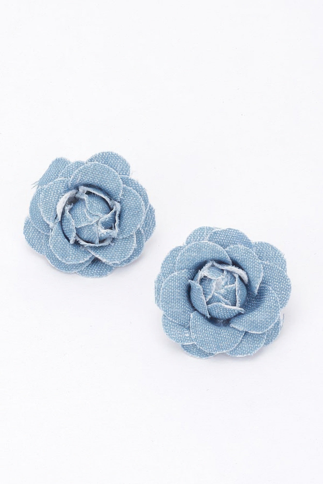 Denim flower earrings, light blue rosette with textured petals