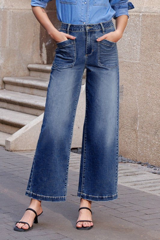 High-waist straight-leg jeans in dark blue denim with front patch pockets