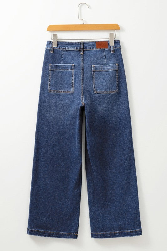 High-waist dark blue straight-leg jeans with patch pockets and button closure
