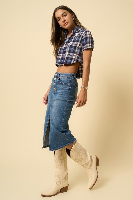 Denim midi skirt with button closure at waist and side front slit