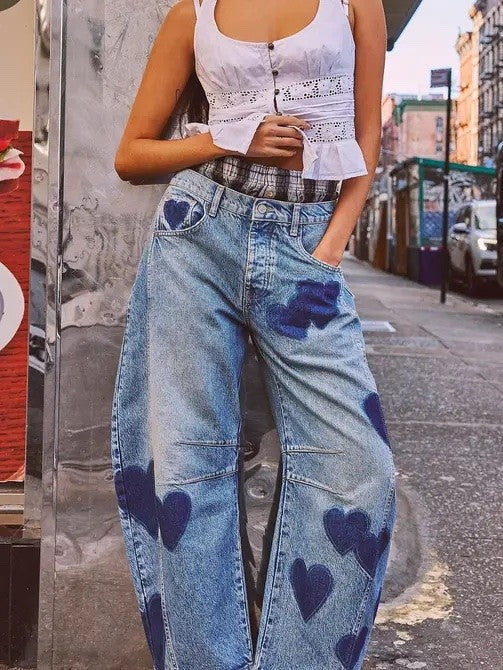 Light blue heart-print denim jeans, high waist, belt loops, button fly