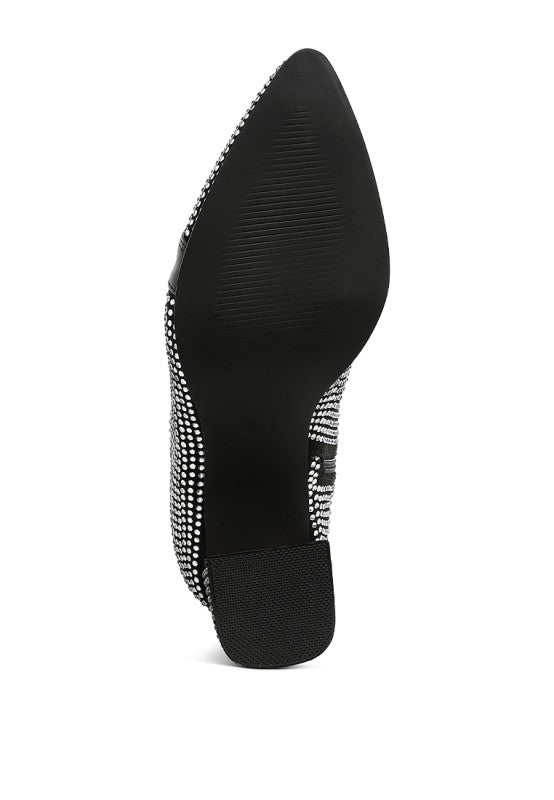 Black ankle boots with rhinestone trim along the side and stacked heel