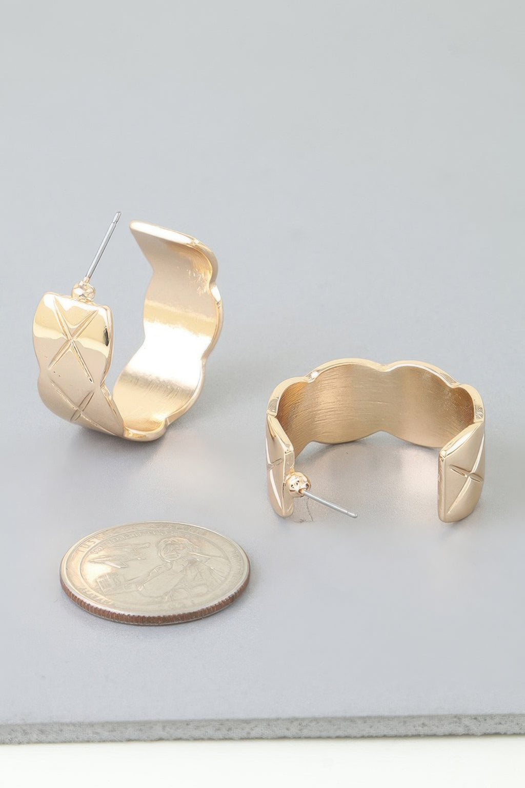 Gold diamond quilt-cut hoop earrings, hinge view with textured band
