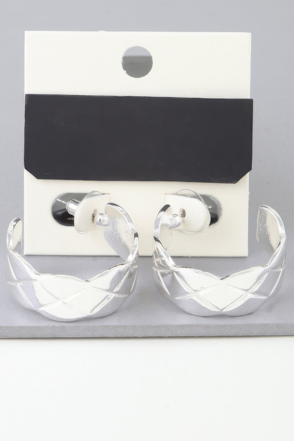Silver diamond quilt-cut hoop earrings, textured crisscross pattern