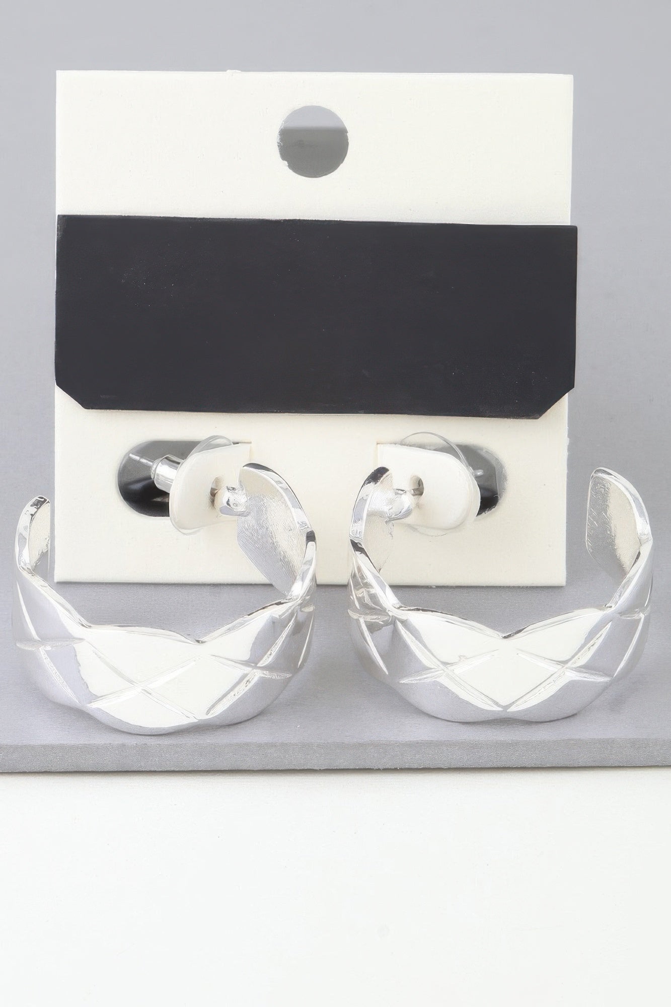 Silver diamond quilt-cut hoop earrings, textured crisscross pattern