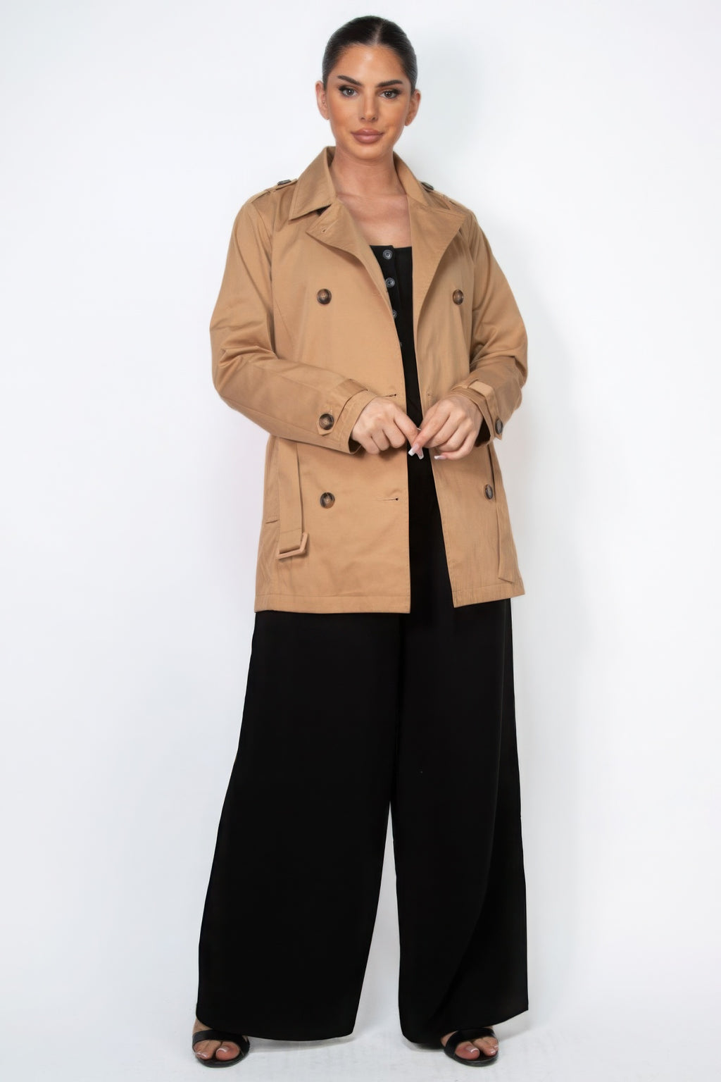 Camel double-breasted belted coat with notch collar, buttons, and front pockets