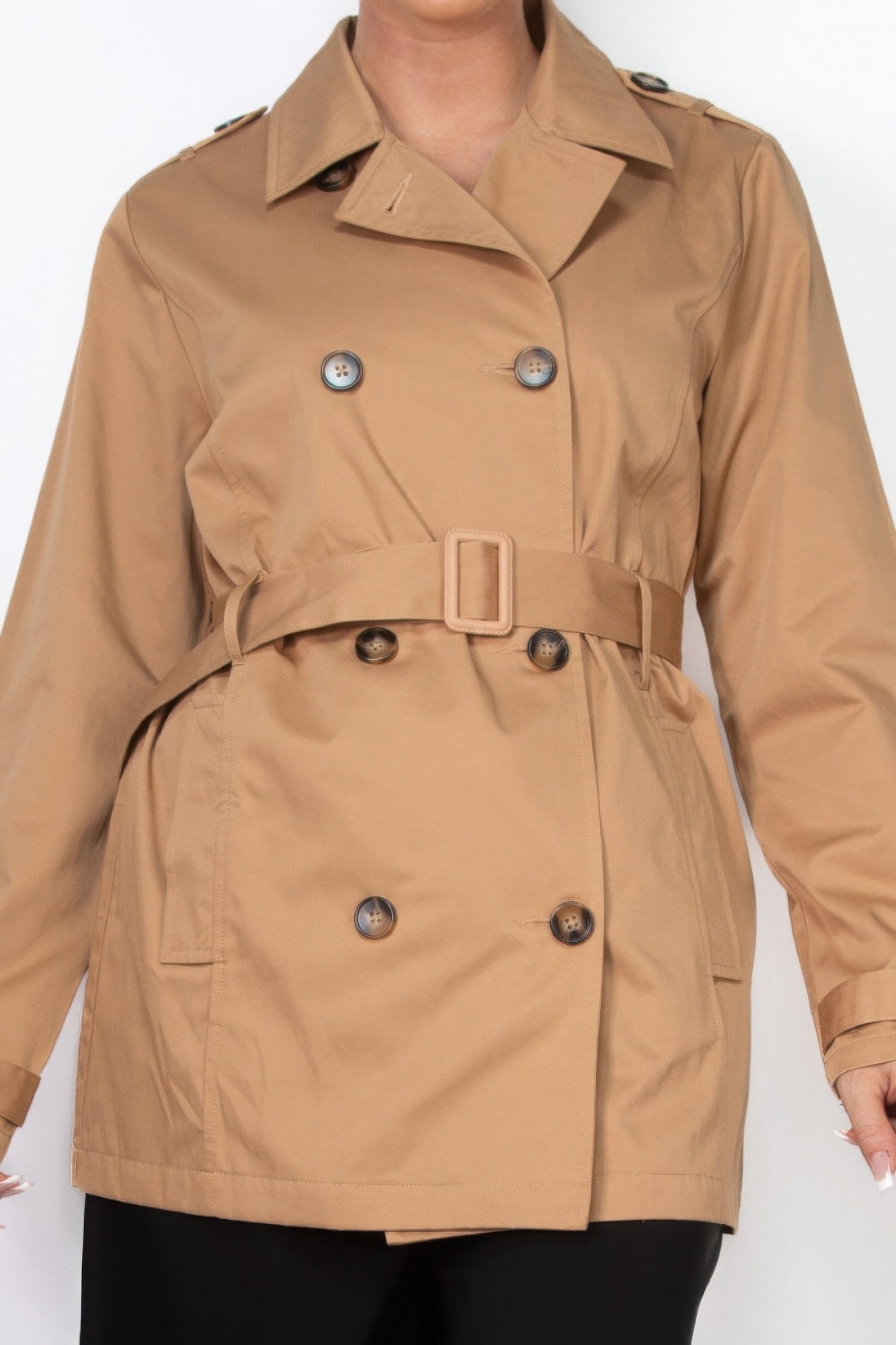 Camel belted double-breasted coat close-up with front buttons and buckled belt