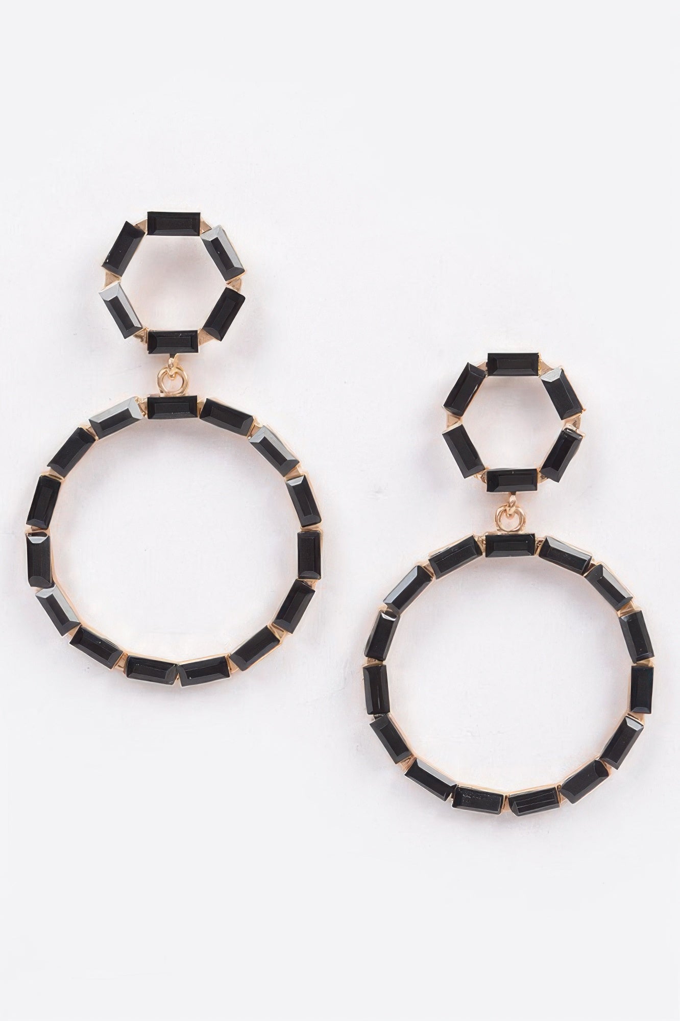 Double circle dangle rhinestone earrings in black with gold-tone rings