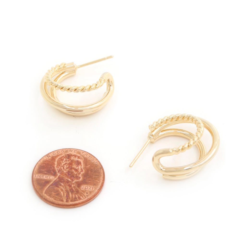 Closeup of gold rope-texture double hoop earrings with secure post backs
