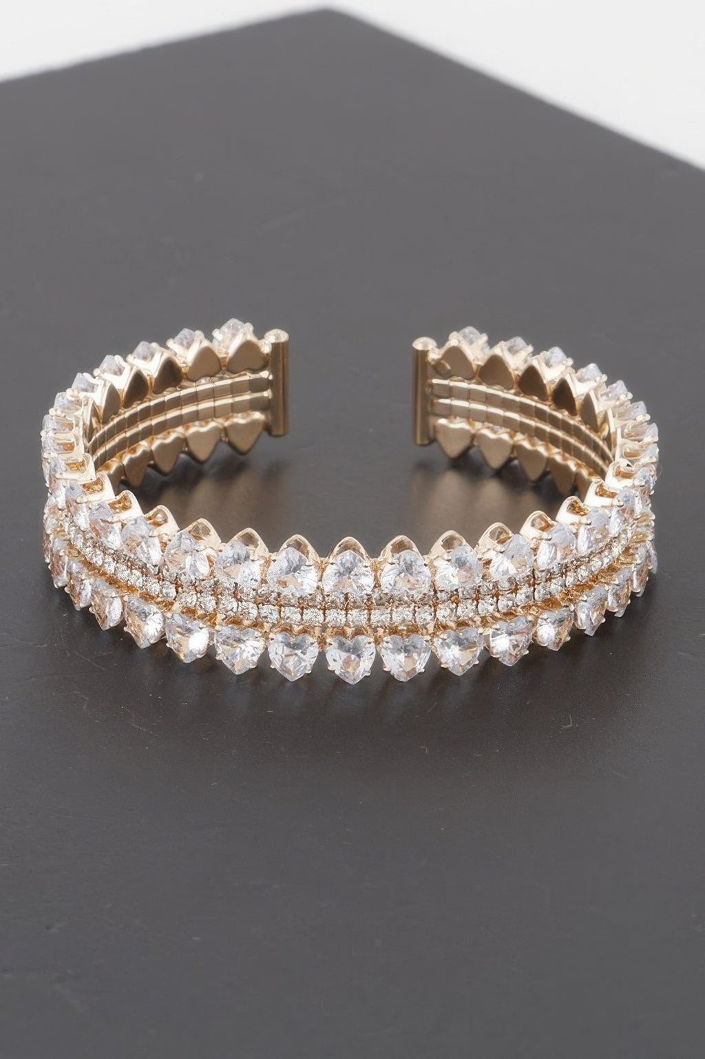 Double jeweled cuff bracelet, gold-tone band with clear crystal rows