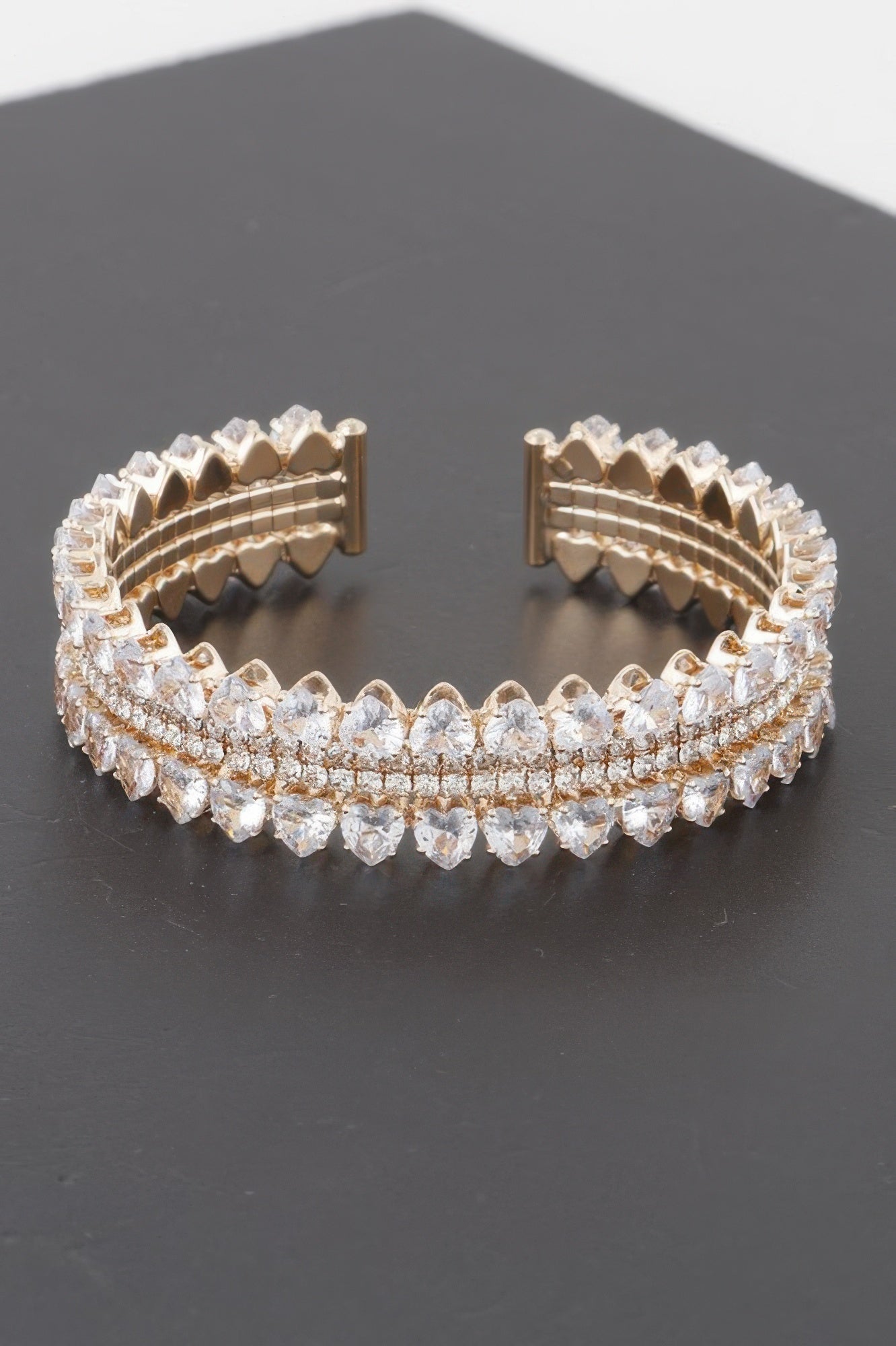 Double jeweled cuff bracelet, gold-tone band with clear crystal rows