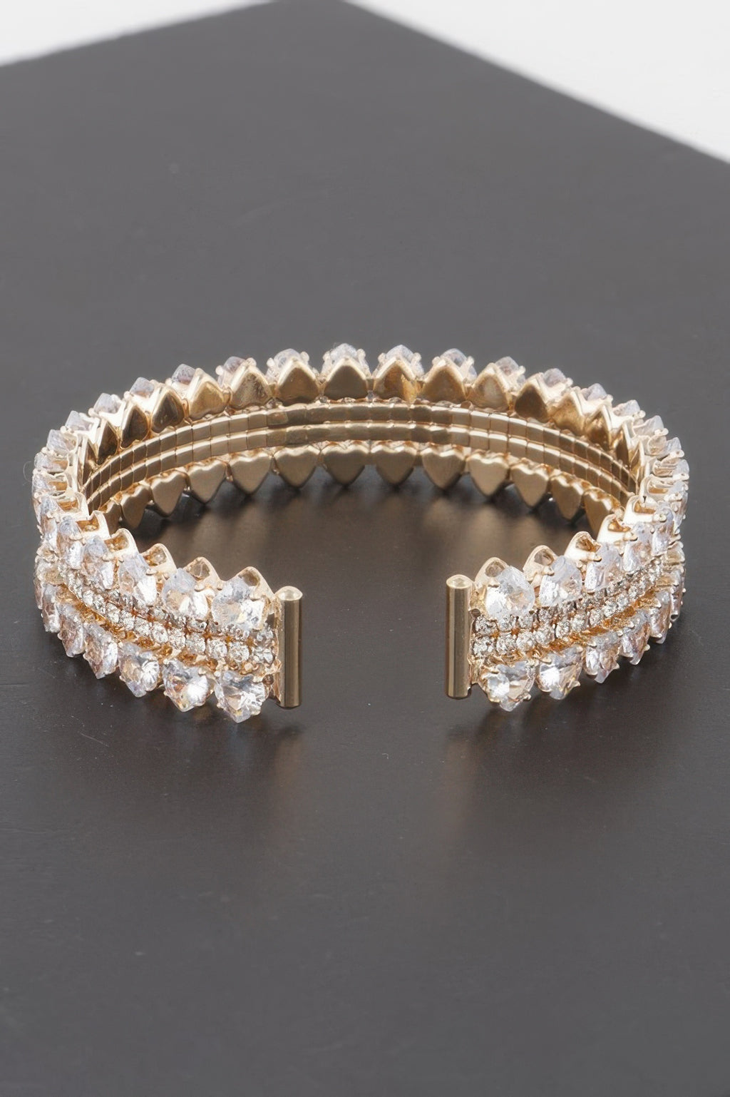 Double jeweled cuff bracelet with clear pavé rows and gold-tone side clasps