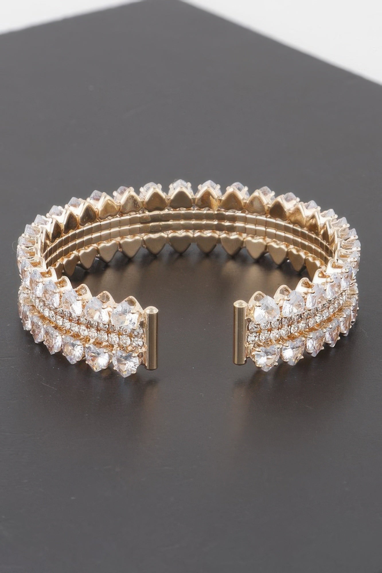 Double jeweled cuff bracelet with clear pavé rows and gold-tone side clasps