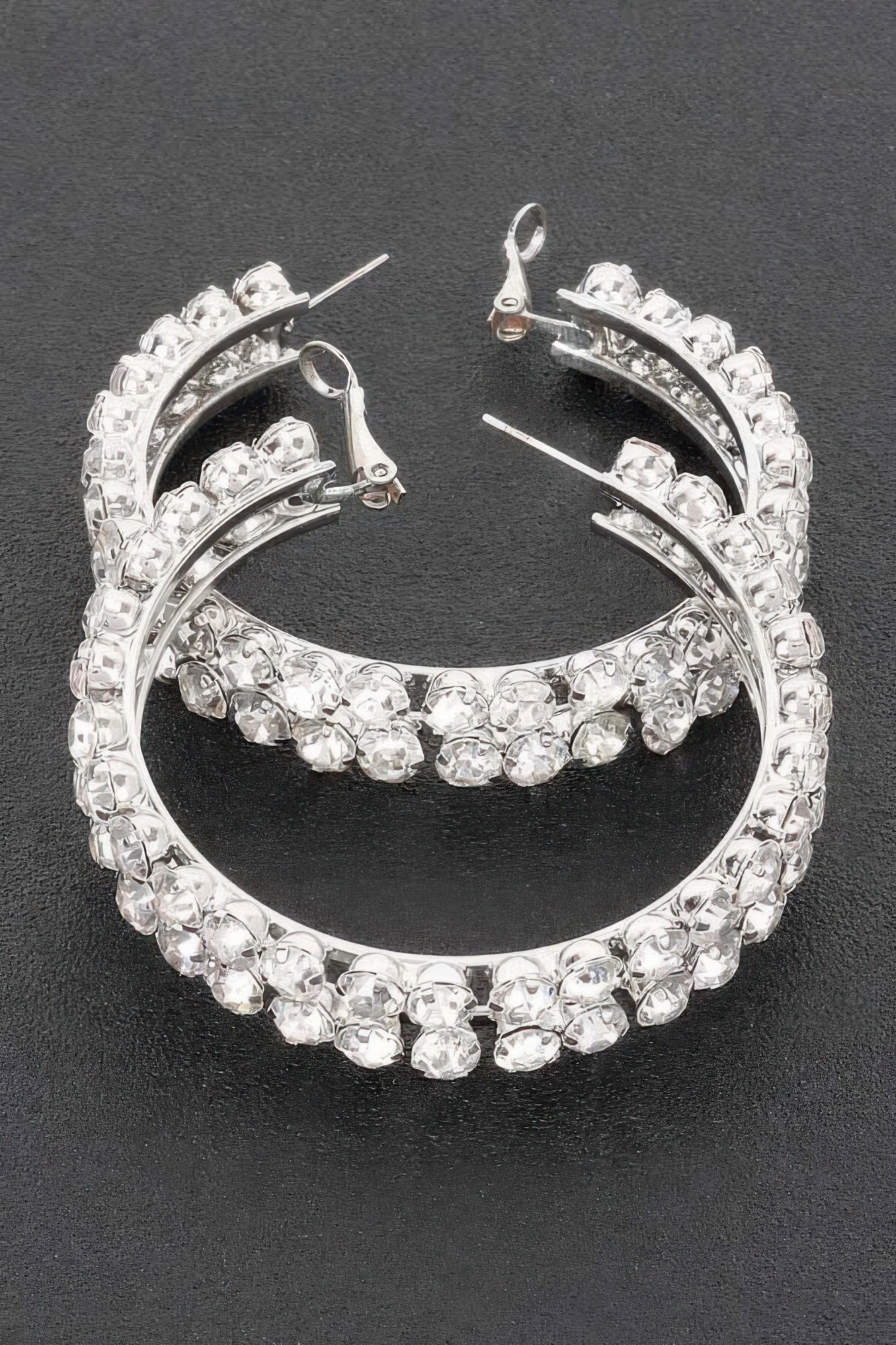Silver double-layer rhinestone hoop earrings with arched wire and two stone bands