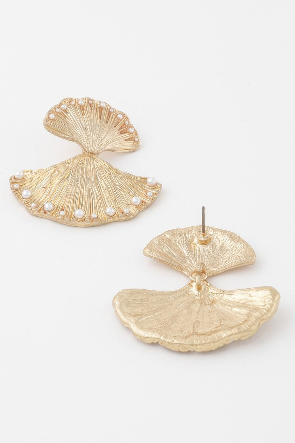 Gold double pearl clam earrings with stud posts, fan-shell ridges, and pearl details