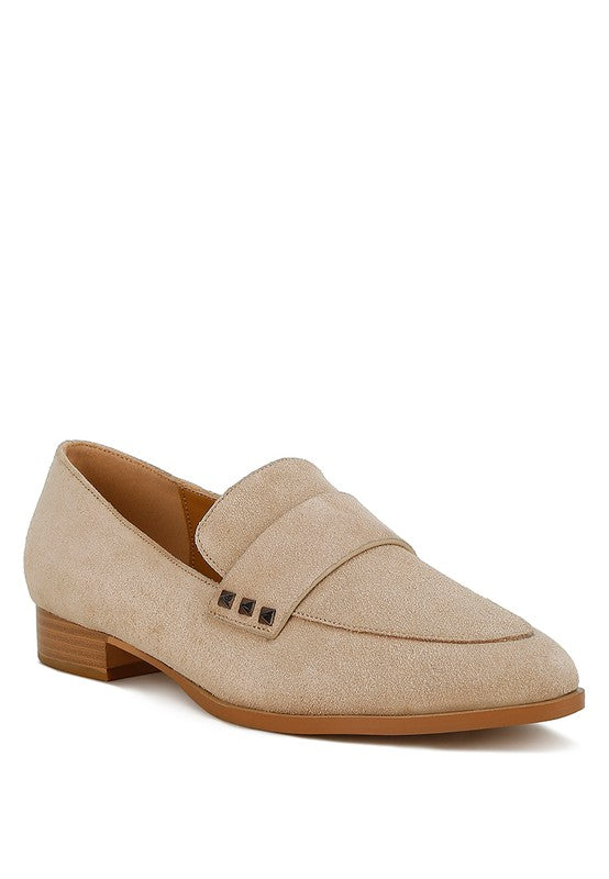 Sand suede loafers with black square stud detail on the strap