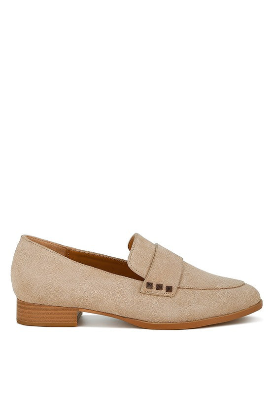 Sand suede penny loafer with black square stud detail on the front