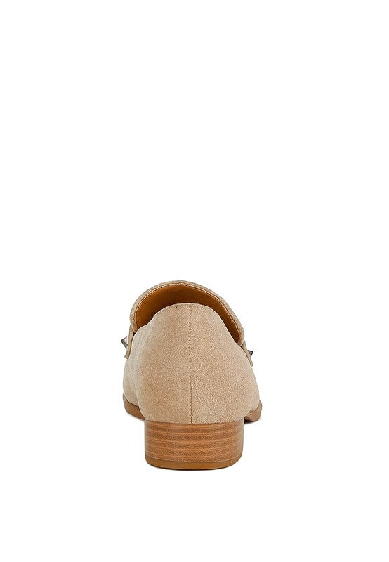 Sand suede loafer back view with low stacked heel and strap stud detail