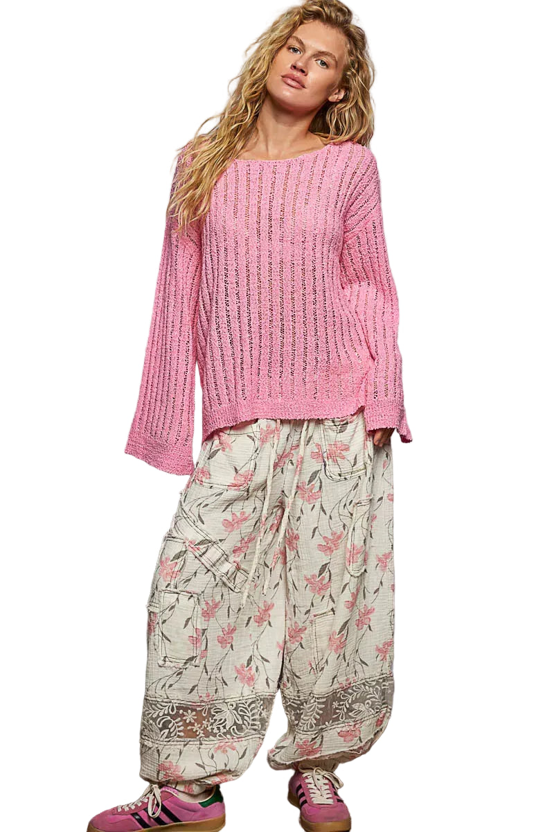 Pink open-knit long-sleeve sweater with round neck, relaxed fit