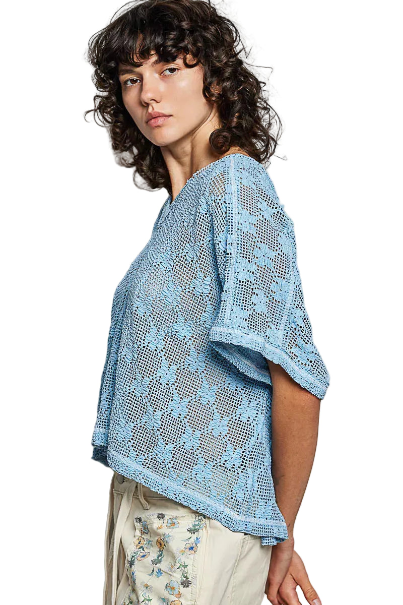 Blue crochet lace short sleeve top with side drape and V-neck opening