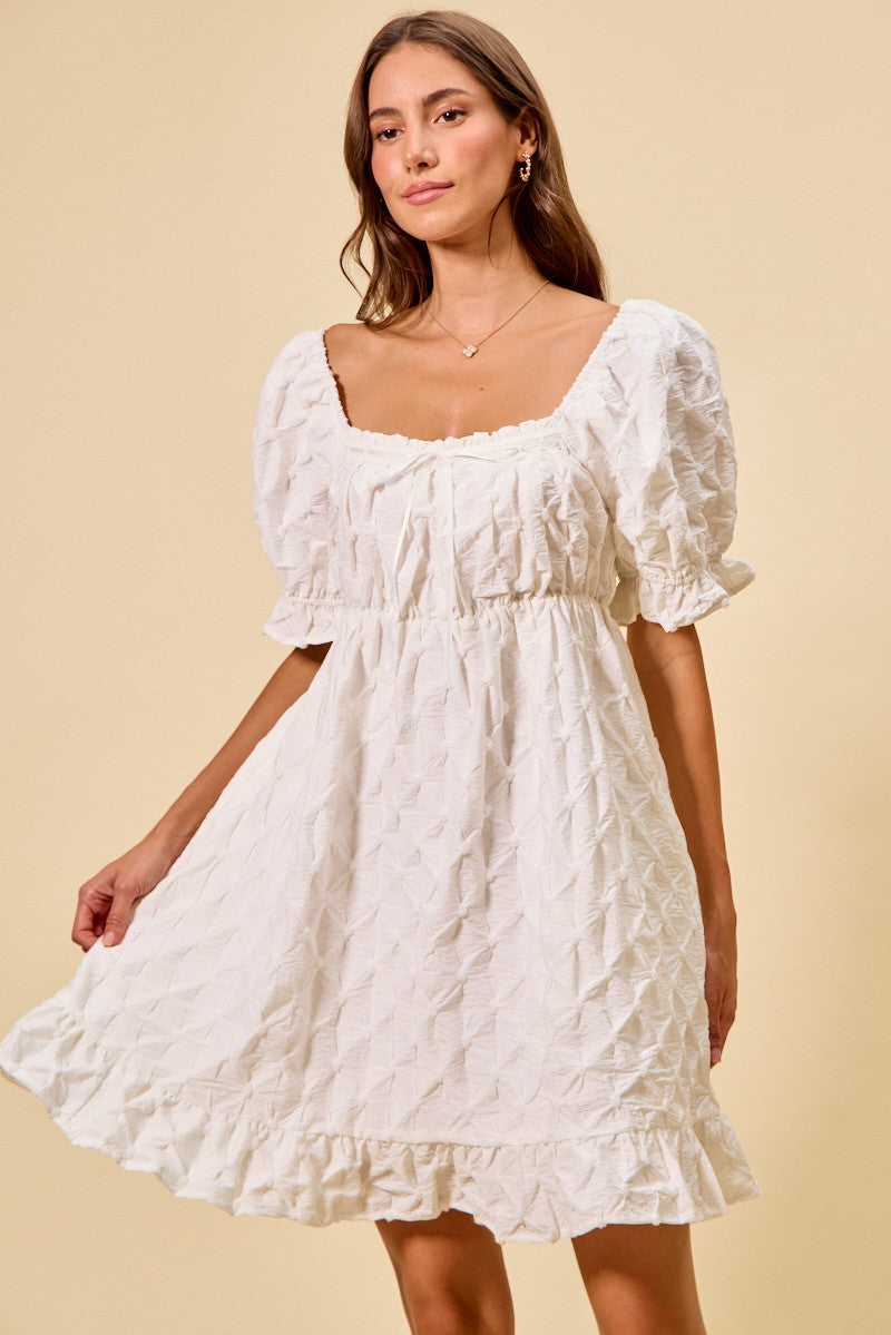 Off-white mini dress with square neckline, gathered bodice, puff sleeves and ruffle-trim hem