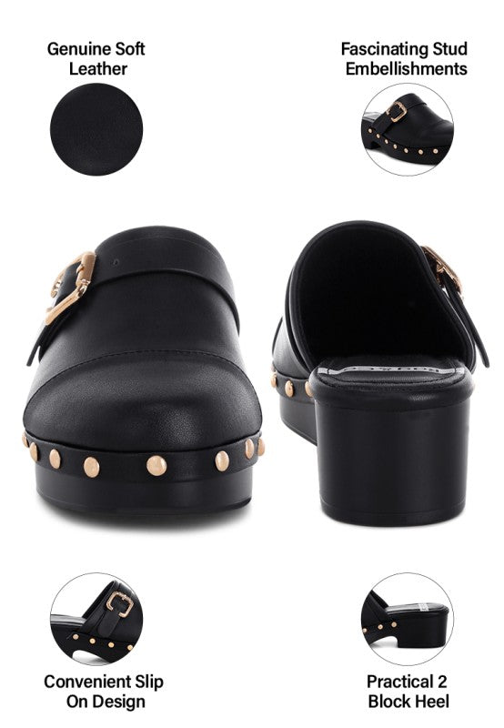 Black clog pair view with stud embellishments and slip-on buckle strap