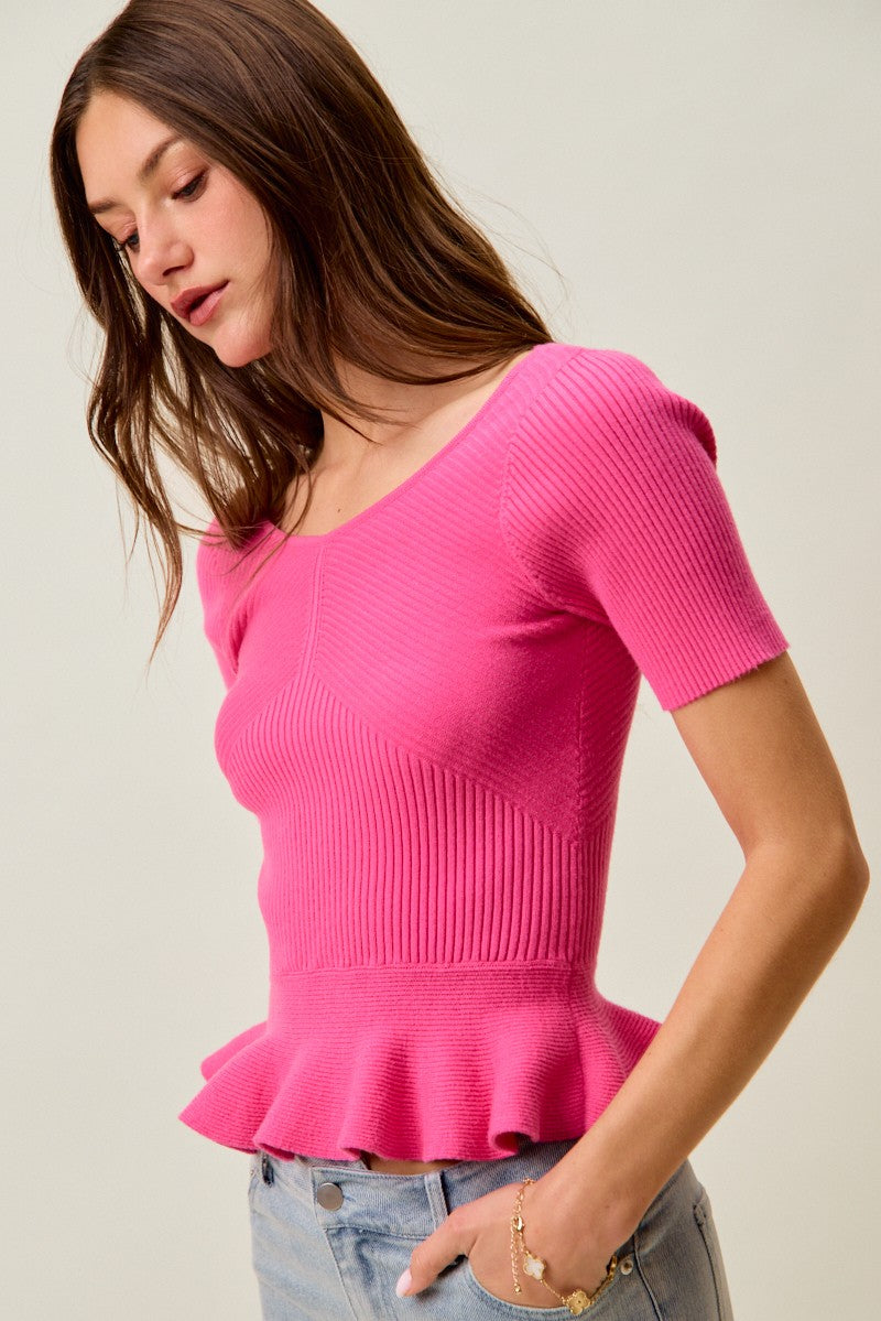 Hot pink ribbed knit peplum sweater top, peplum ruffle detail, short sleeves