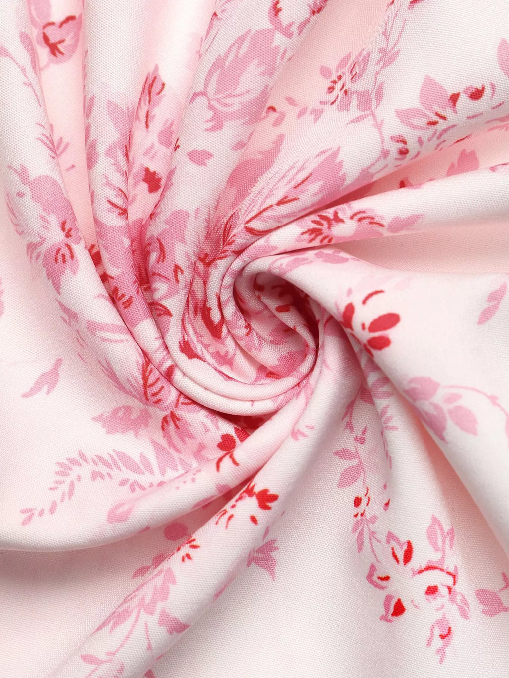 Fabric close-up: pink floral print on lightweight cami dress material