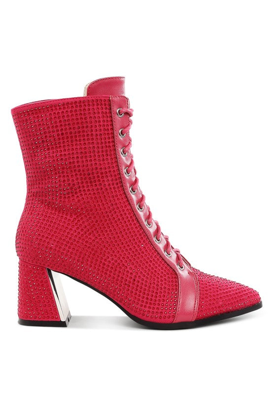 Fuchsia ankle boots with rhinestone texture and lace-up front