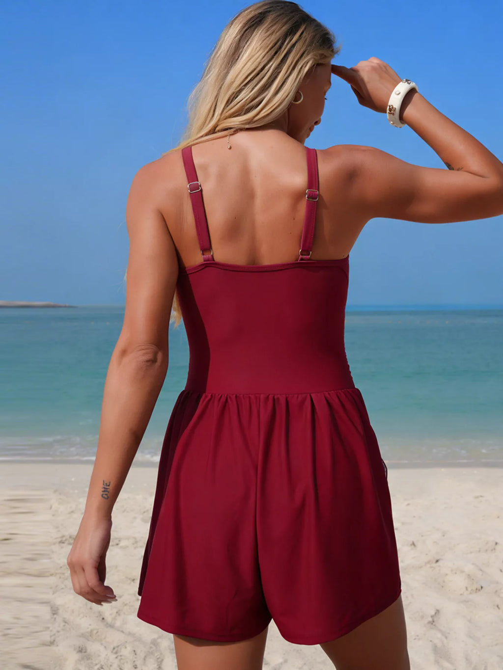 V-neck one-piece swimsuit romper back view in burgundy with adjustable straps
