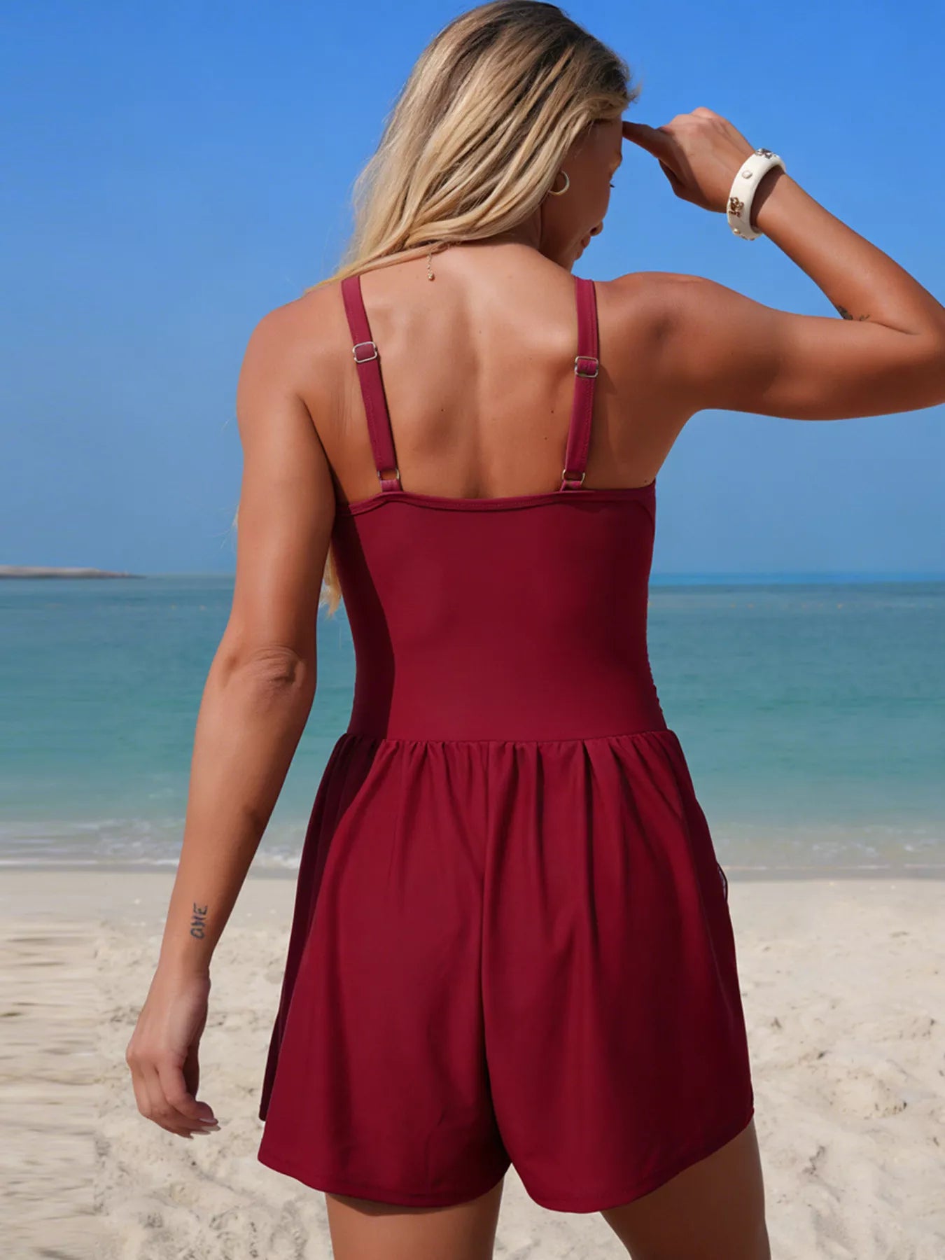 V-neck one-piece swimsuit romper back view in burgundy with adjustable straps