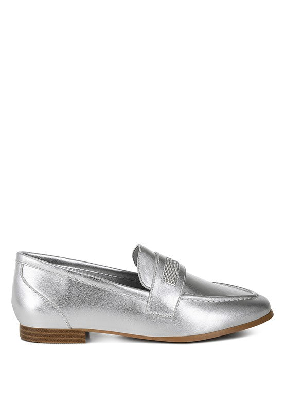 Silver metallic loafer side view with rhinestone strap detail