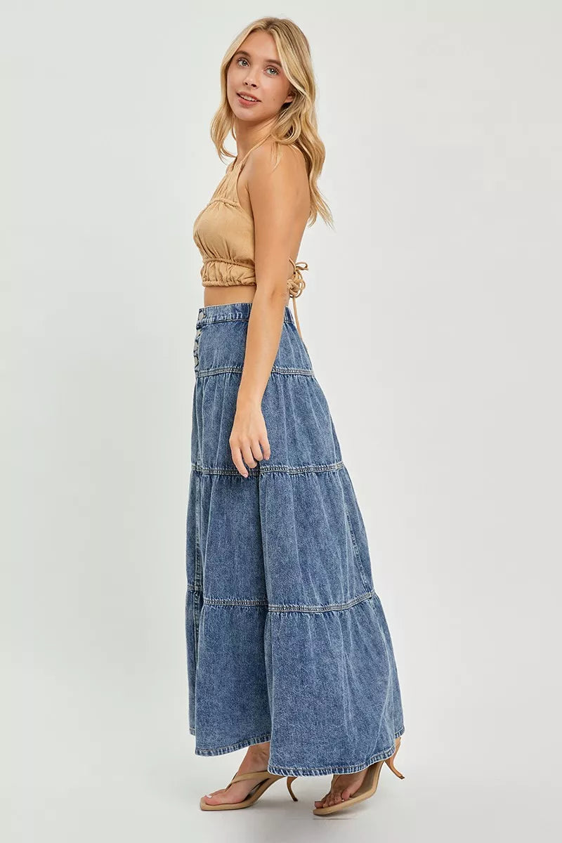High-rise denim maxi skirt with tiered ruffle bands and side silhouette, medium blue
