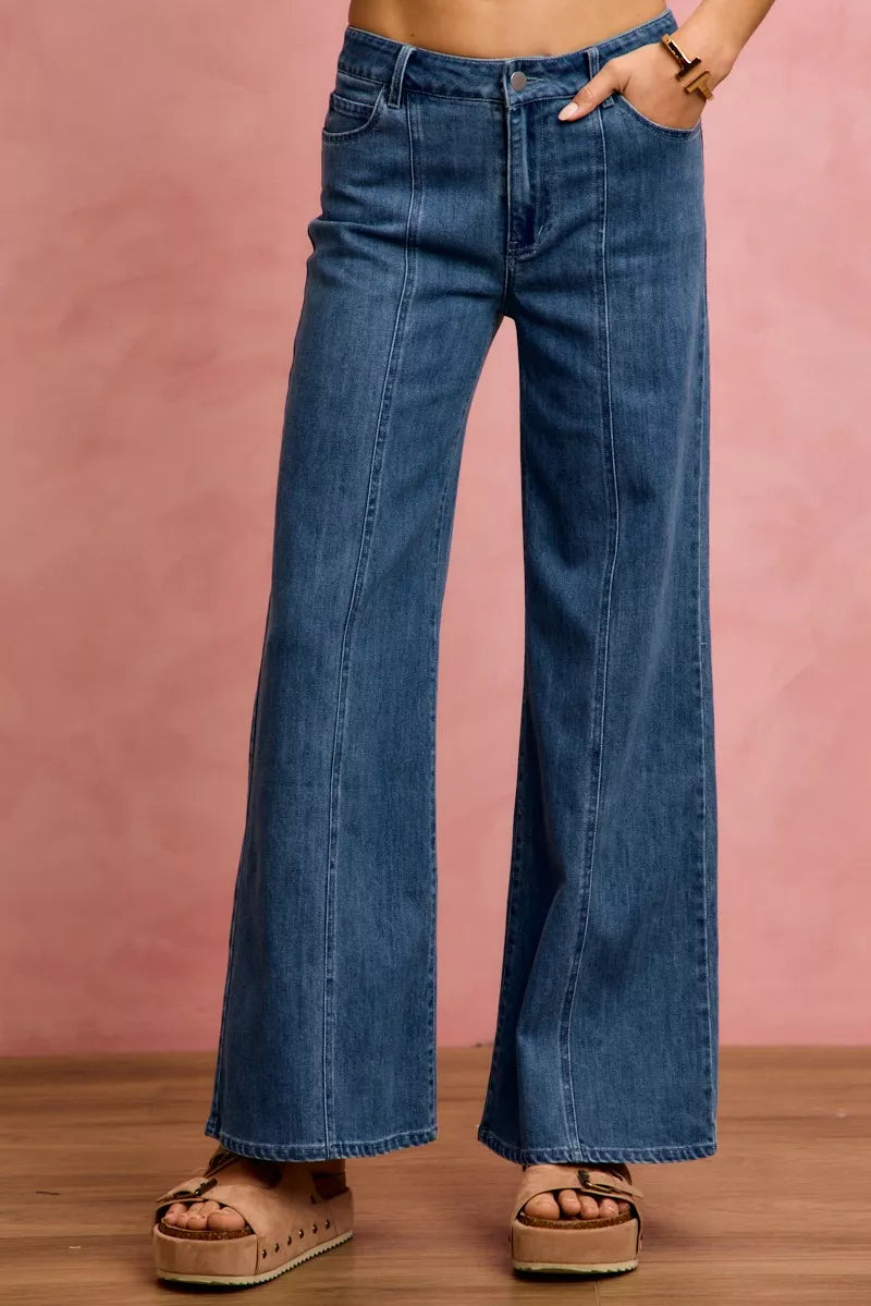 SO ME denim jeans, mid-rise wide-leg with fly button closure and subtle wash variations.