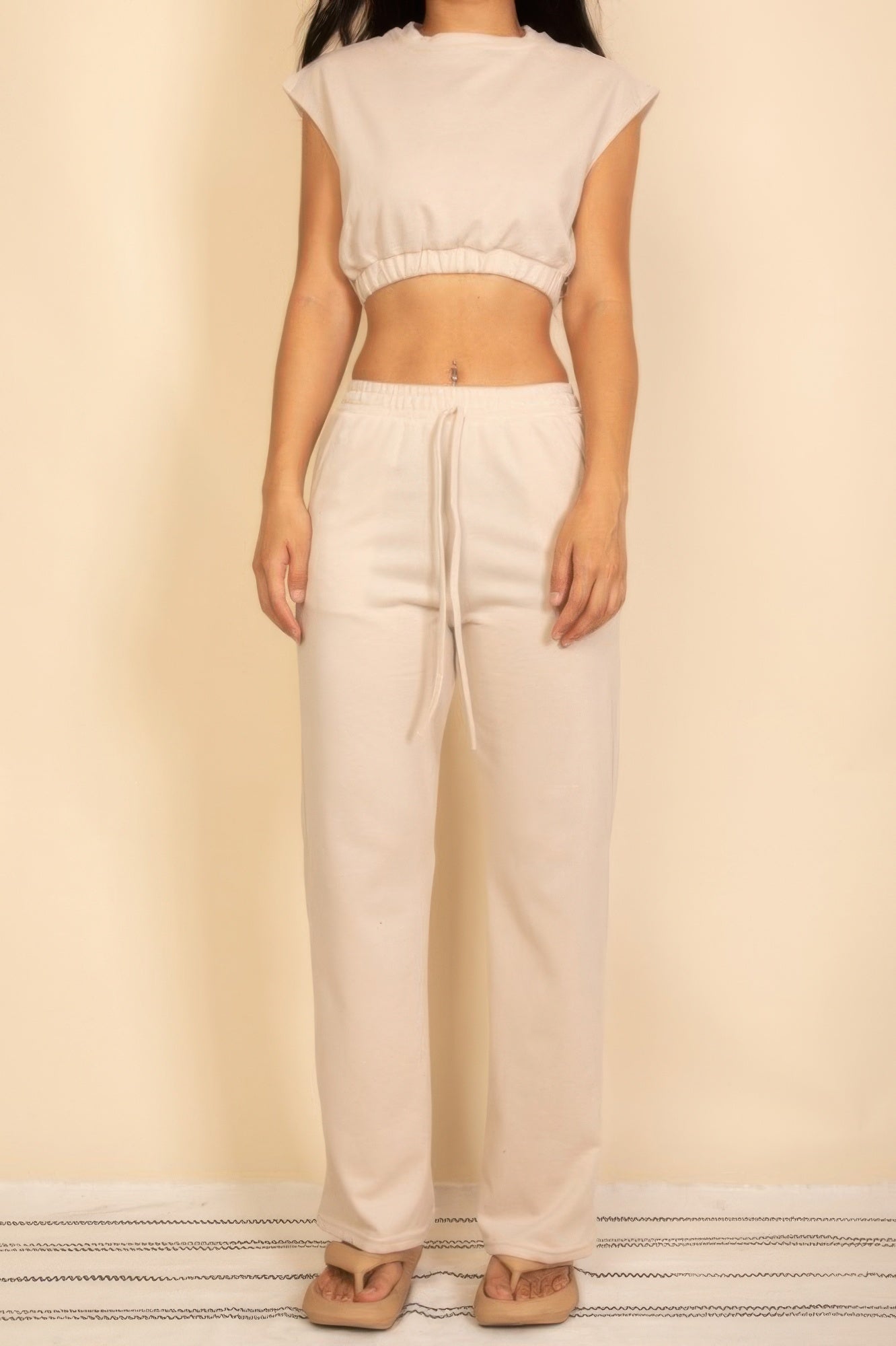 Elastic crop top and wide-leg pants set in white, faux drawstring