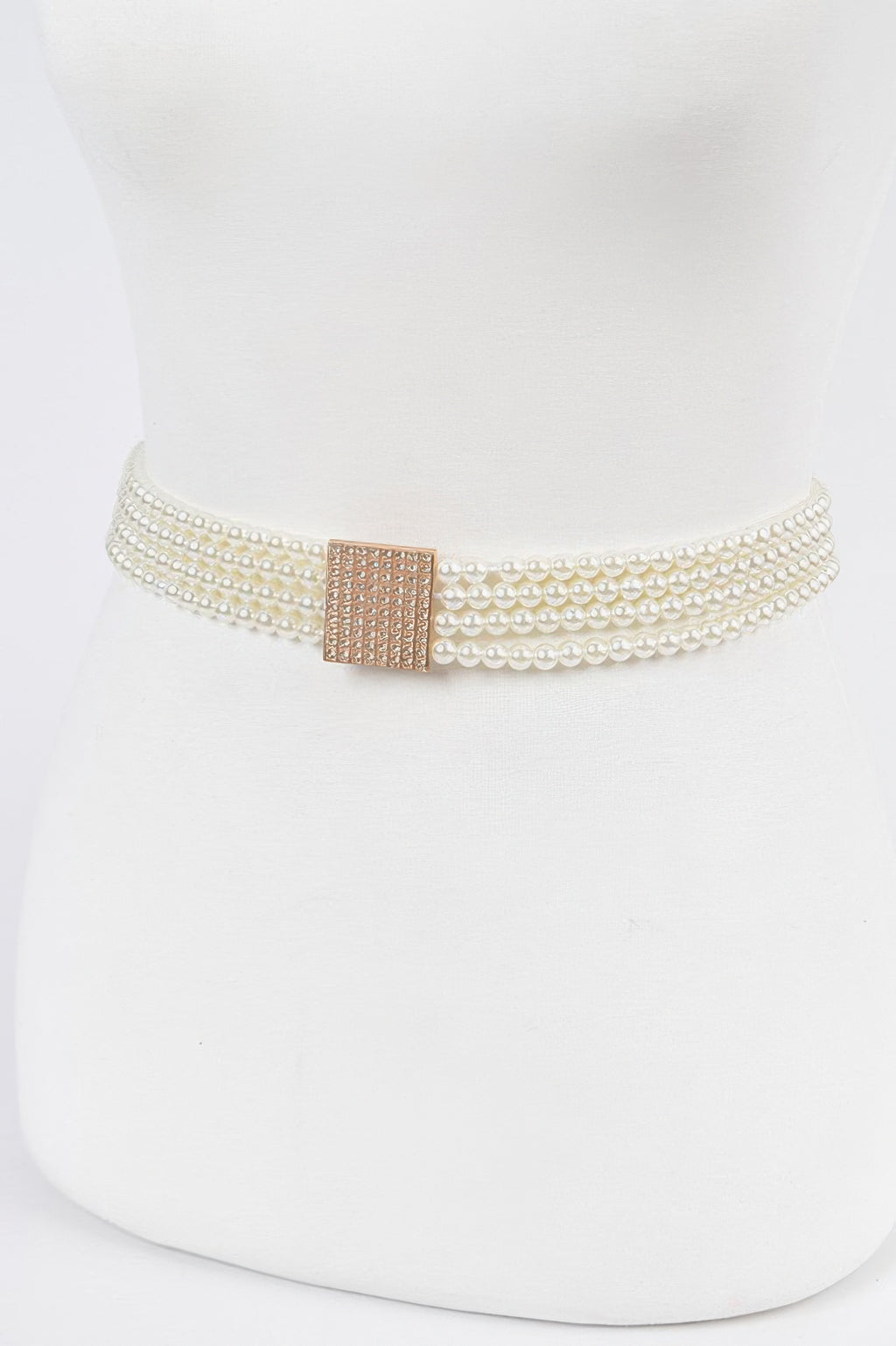 Ivory elastic pearl belt with stacked pearl rows and square rose-gold clasp