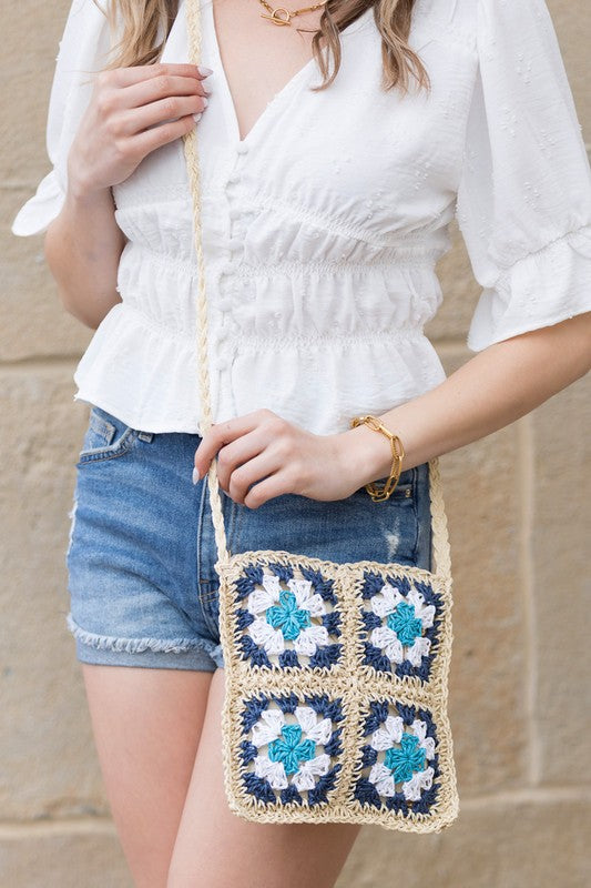 Eliza Crochet Straw Crossbody: navy with turquoise/white flower appliqués