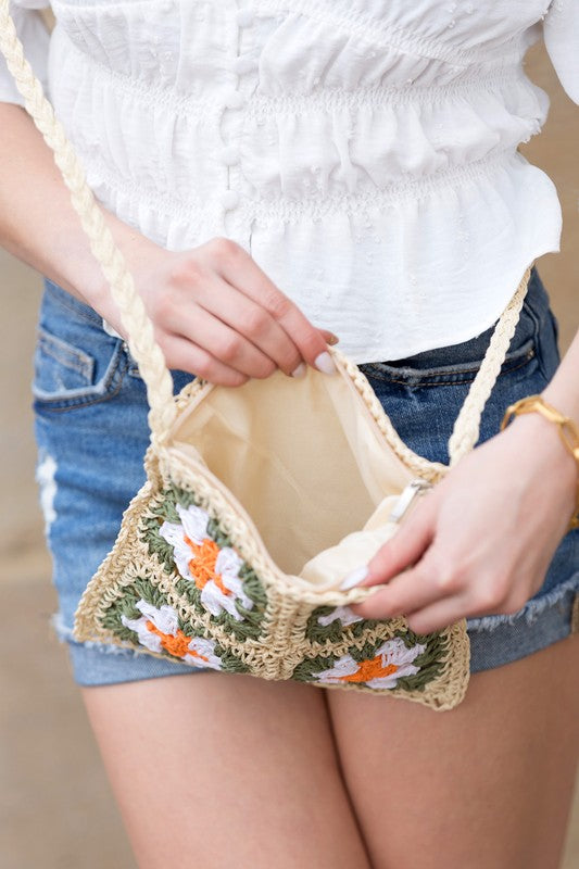 Eliza Crochet Straw Crossbody, open top with beige lining and orange/green flower crochet
