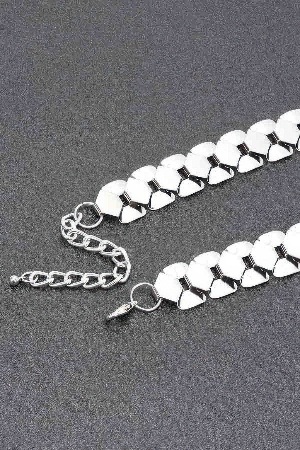 Silver-toned Elysian Circle Necklace links with clasp and chain extension shown