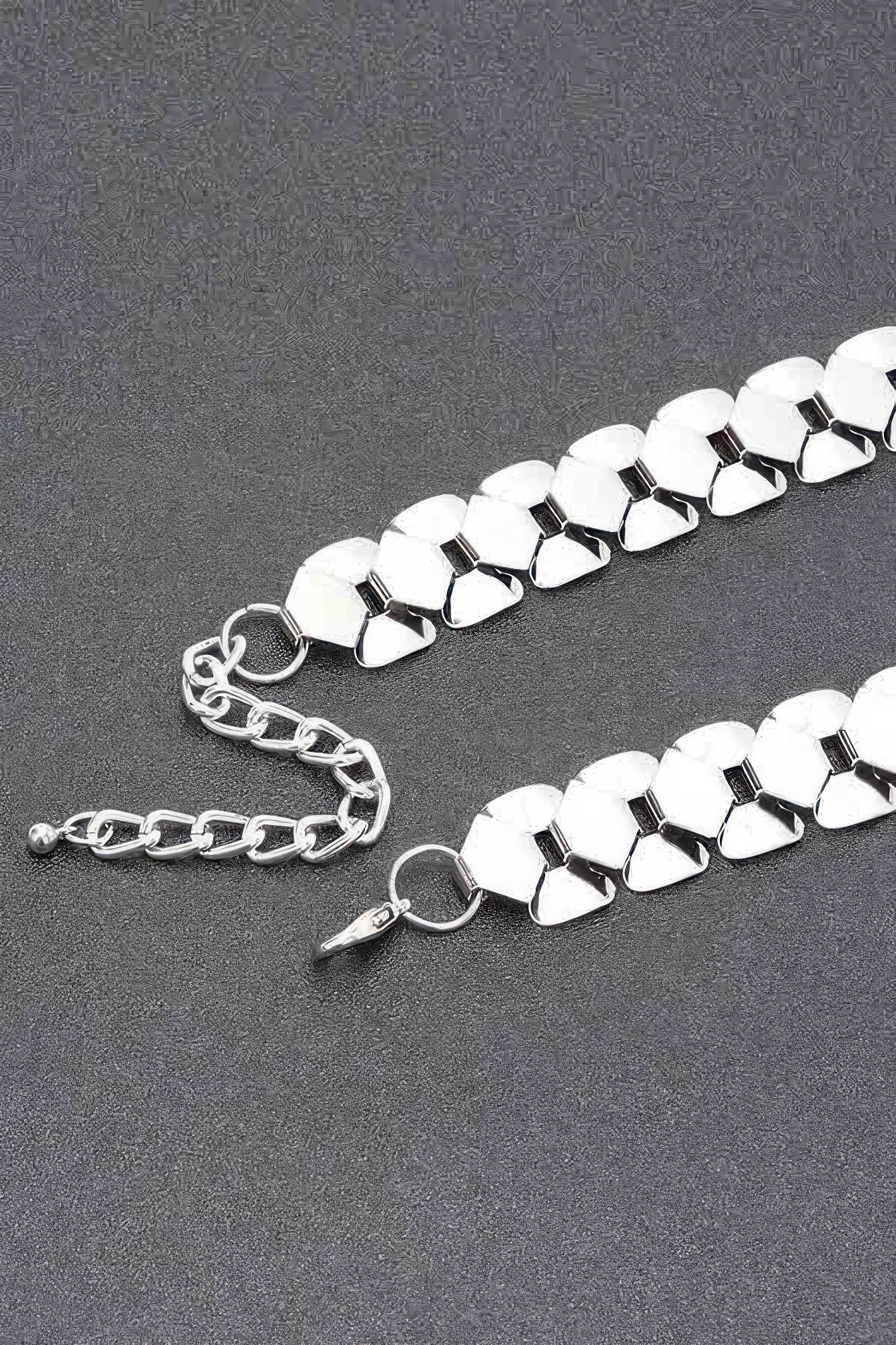 Silver-toned Elysian Circle Necklace links with clasp and chain extension shown
