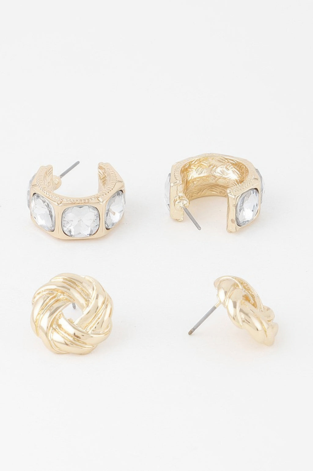 Gold-tone zircon earrings set, side view of hoop settings with clear stones