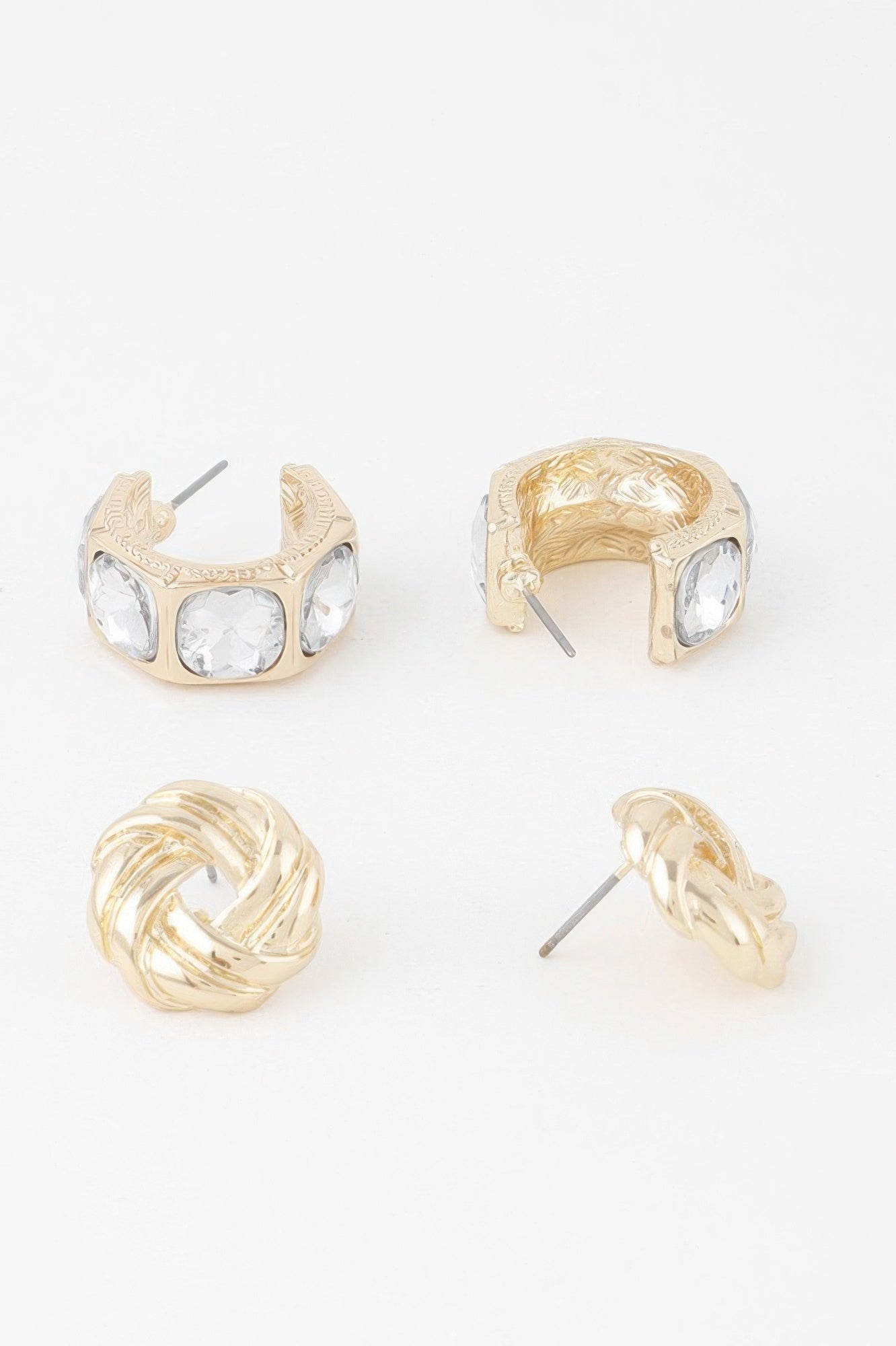 Gold-tone zircon earrings set, side view of hoop settings with clear stones