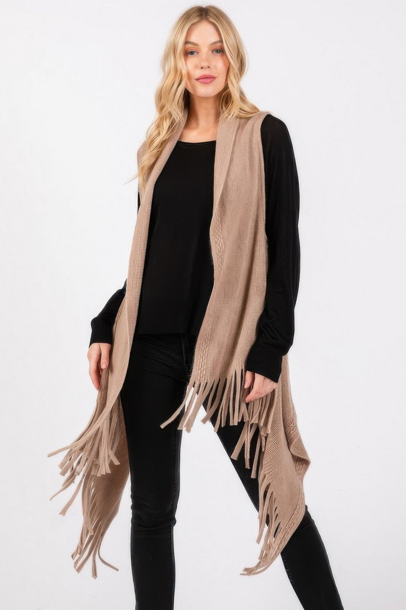 Taupe knit vest with embossed dotted line texture and tassel fringe panels