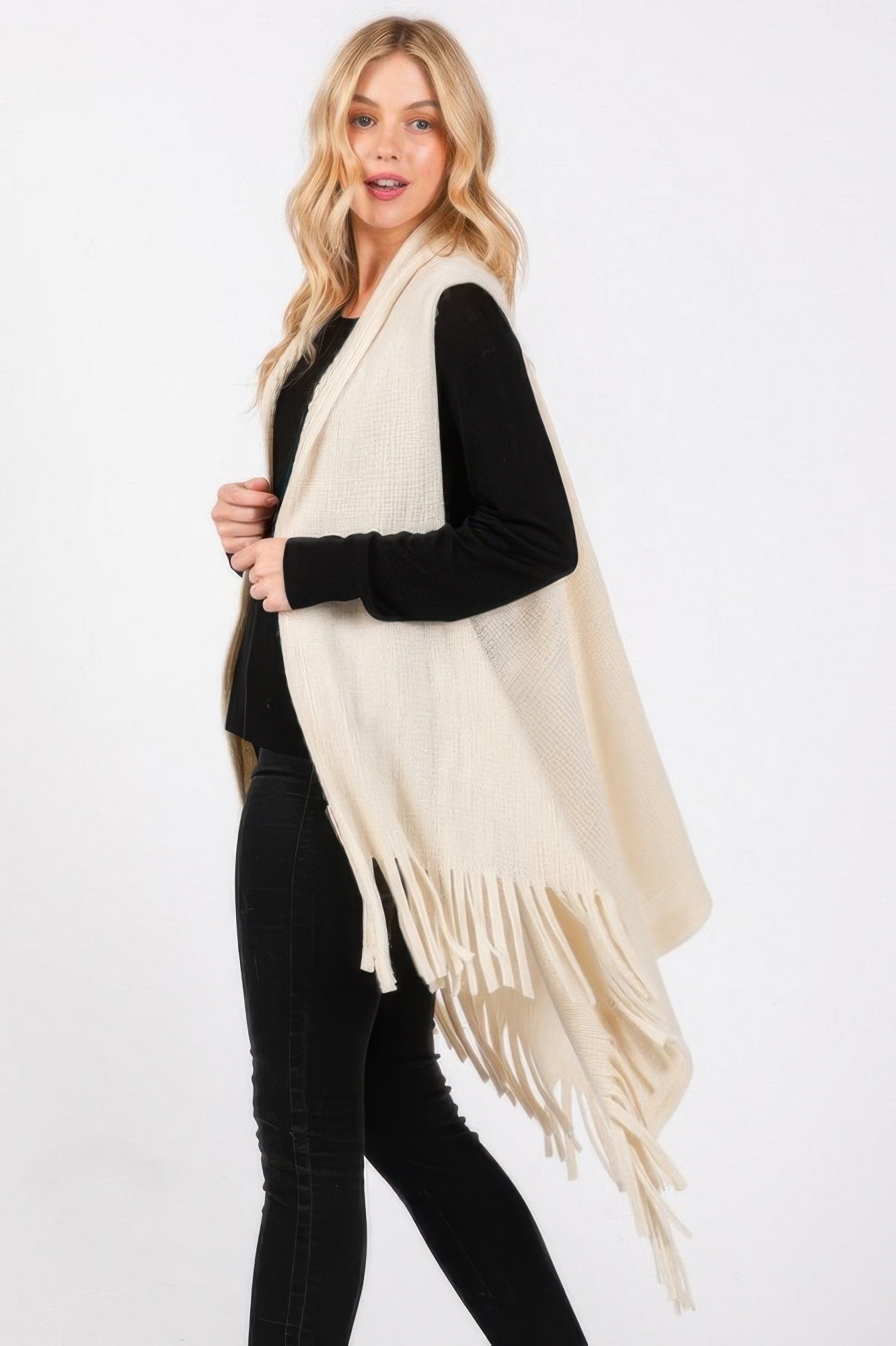 Ivory knit vest with side fringe and open front