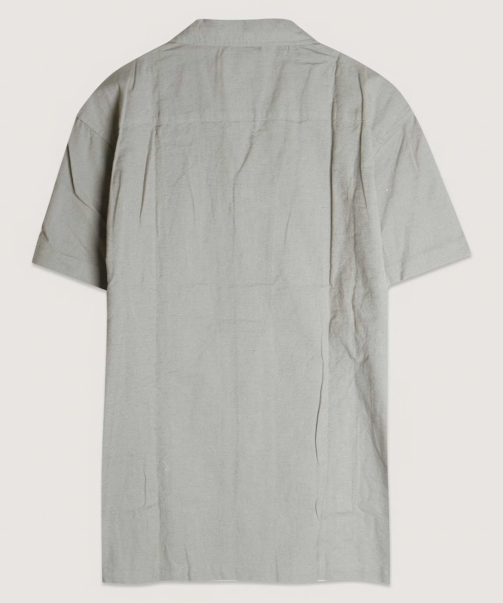 Back view: light gray embroidered-panel camp shirt with short sleeves and collar