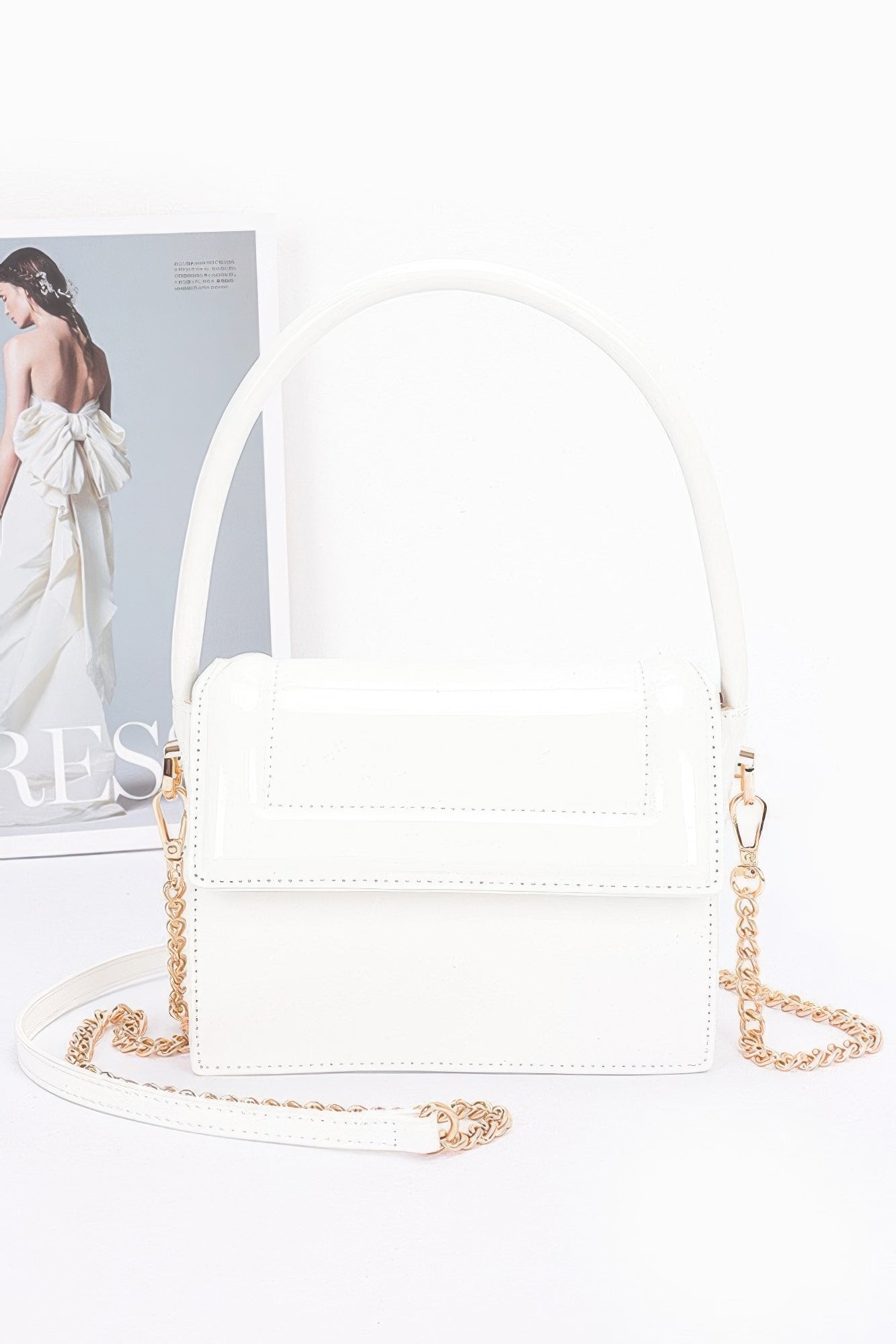 Enamel top handle flap bag, white with top handle and gold-tone chain strap
