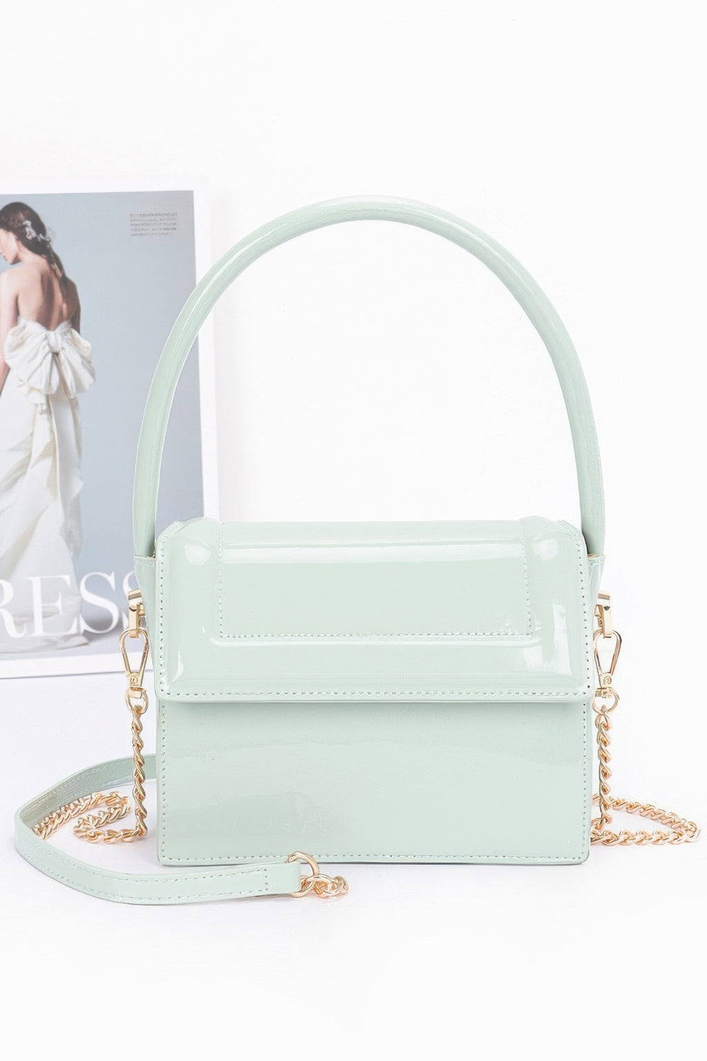 Enamel top handle flap bag, mint green with glossy finish and gold-tone hardware