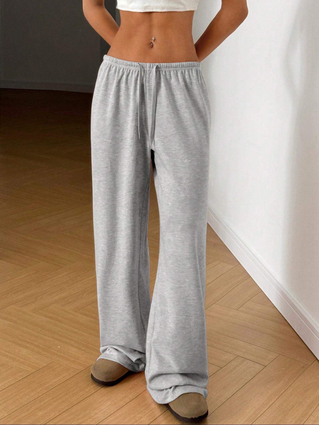 Gray relaxed drawstring pants, loose wide-leg style with gathered elastic waist